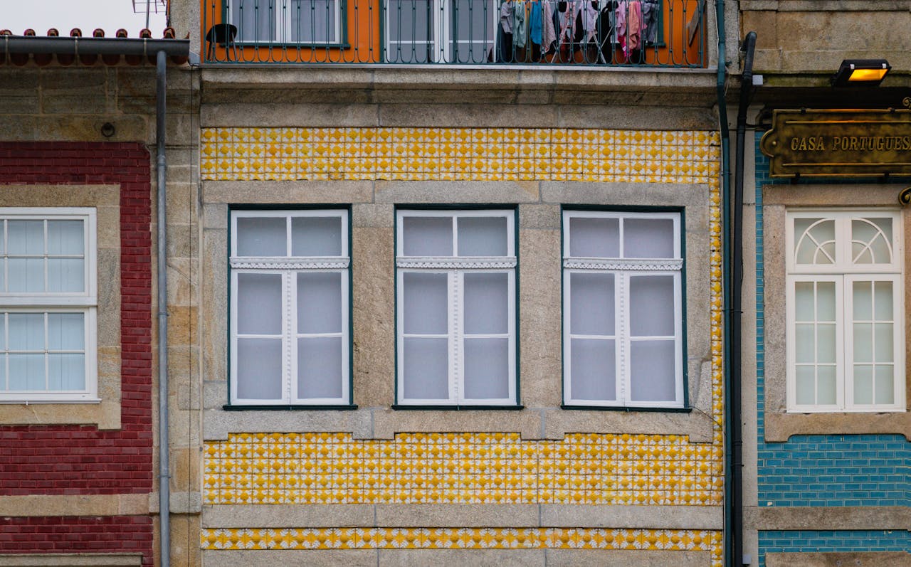 Vibrant Portuguese architecture with iconic yellow tiles in Porto, Portugal.